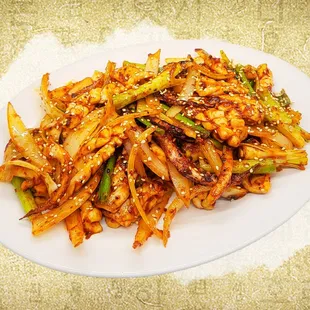 a plate of stir fried vegetables