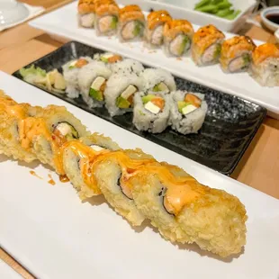 (Top to bottom) edamame, Washington roll, Philadelphia roll, &amp; Baked Alaska roll