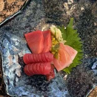 a plate of sashi