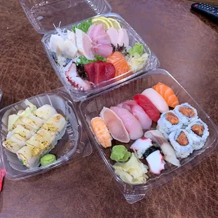 sashimi and nigiri combo with a scallop maki