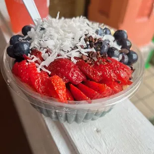 strawberries and blueberries in a bowl