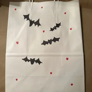 Hand decorated paper take away bags!