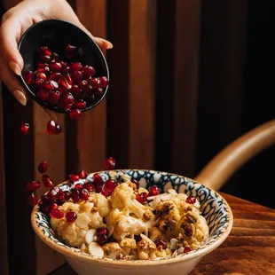 a bowl of oatmeal with cranberries