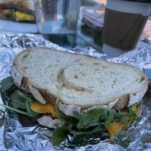 a sandwich with cheese and lettuce