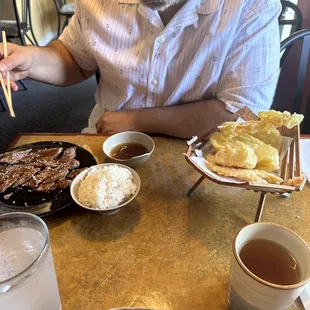 a man eating a meal at a restaurant