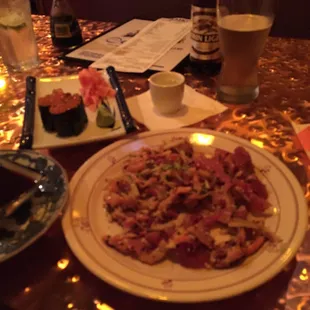 The always extremely delicious spicy salad.... With salmon roe, Kirin light and hot sake !!!