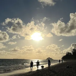 Every morning people come out to watch the sunrise at Kailua beach. A beautiful routine.