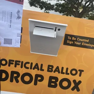 Do you see the little round camera by the slot opening? 11/04/22 The drop box is by the Times Supermarket side.