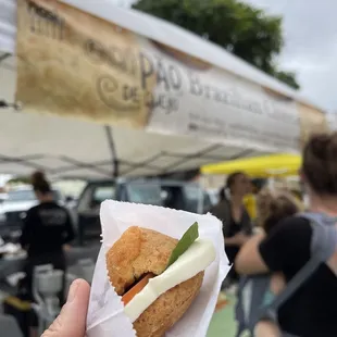  person holding a sandwich