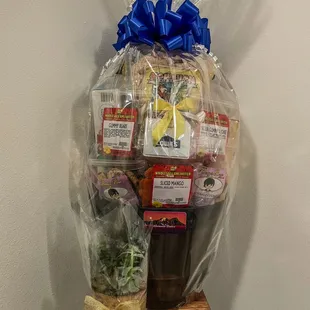 a basket of food wrapped in plastic