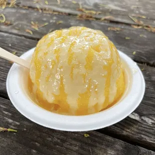 Mango with condensed milk, and vanilla ice cream