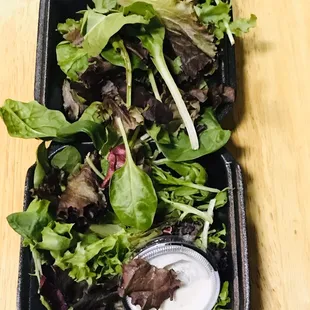 Smaller salad with only greens, LOTS OF GREENS &amp; NOTHING ELSE but the salad dressing - disappointing