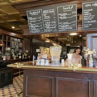 a woman behind the counter