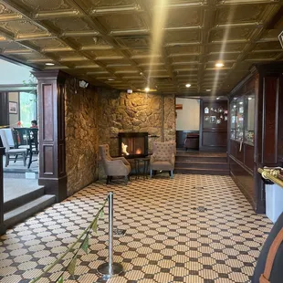 a coffee shop with a fireplace