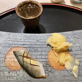 a piece of fish on a cutting board