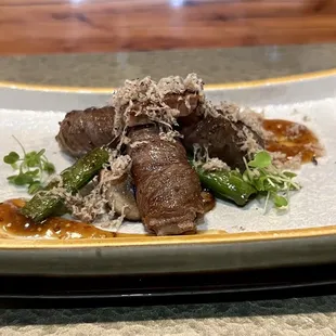 A5 wagyu ribeye with foie gras, micro arugula and truffle toppings