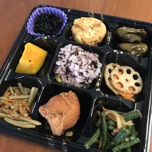 Teruya's Andagi bento. Vegetarian dishes plus one of their andagi.