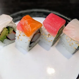 a variety of sushi on a plate