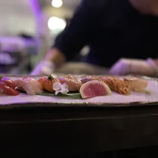 a plate of sushi on a table
