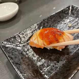 Salmon nigiri with a very mild and slightly sweet gochuchang sauce