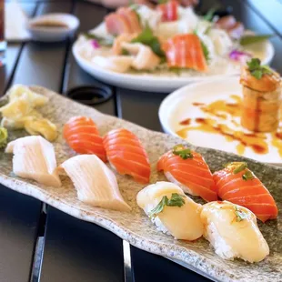 Nigiri, 2 pc per order: Hamachi Toro ($7), Hotate ($6), Sake ($5), Scottish Sake ($7)