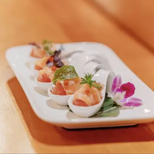 a plate of food on a wooden table