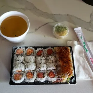 a plate of sushi and a cup of tea