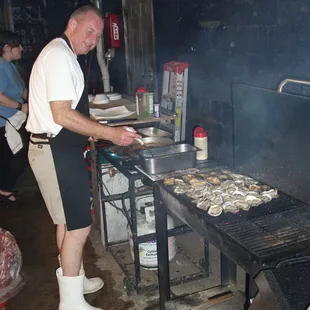 That&apos;s not smoke,it&apos;s culinary perfume created by grill magician Richard as he works his magic.