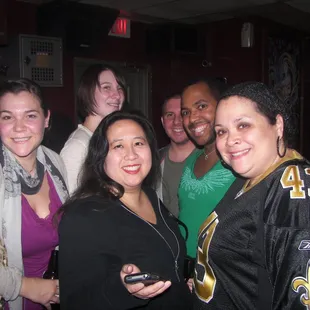 a group of friends posing for a picture