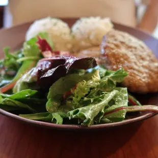 Today&apos;s special: ground beef, salad, and rice.