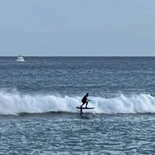 Look at this guy on his hydrofoil surfboard