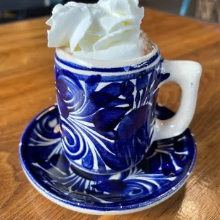 whipped cream in a blue cup