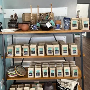 a shelf of coffees