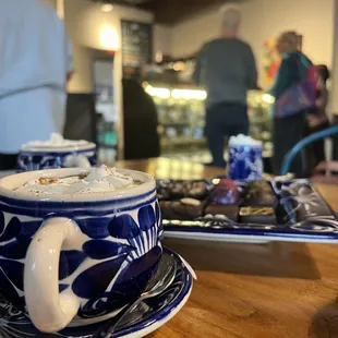 a cup of coffee on a saucer