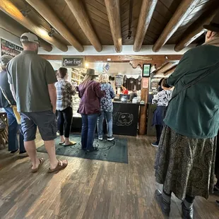 a group of people standing in a room