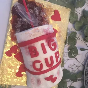 a cup of coffee and a cake