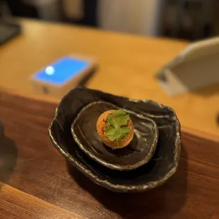 a plate of food on a wooden table
