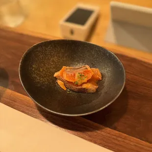 a plate of food on a wooden table