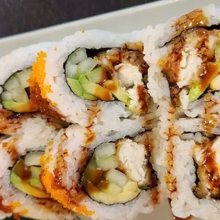 a close up of a plate of sushi