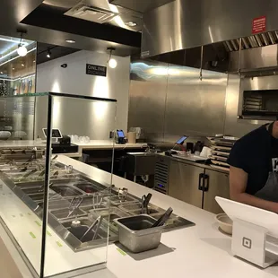 a man working in a kitchen