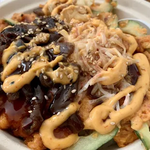 Large spicy tuna bowl mixed with cucumbers &amp; topped with shiitake mushrooms, crab salad, spicy Mayo, &amp; BBQ soy!