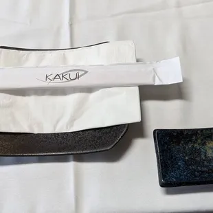 a plate, napkin, and knife