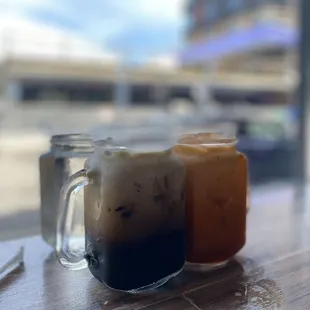 two cold drinks on a table