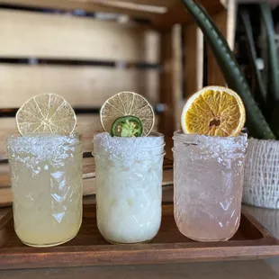 three cocktails with limes and salt