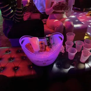 a group of people sitting around a table