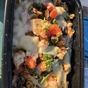 Linguine with tomato, chicken, mushroom, jalapeño, cheese