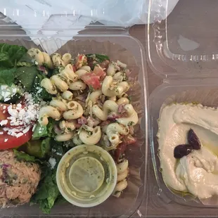 Hummus and salad sampler plate. Greek salad, pasta salad and the best tuna salad I&apos;ve had in Nashville. Hummus is the best!