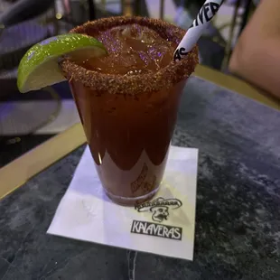 a bloody drink on a napkin