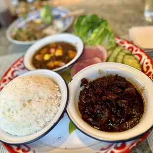 nam prik long rua caramelized pork belly and ground pork with palm sugar, salted egg yolk and crudité, served with jasmine rice