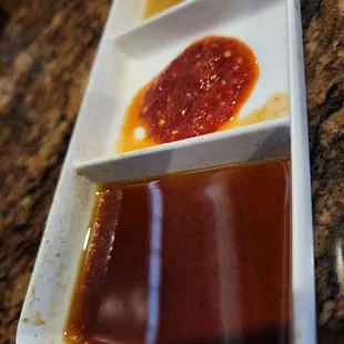 All the stuff around the sauce was old, crusted stuff on the dishes used.